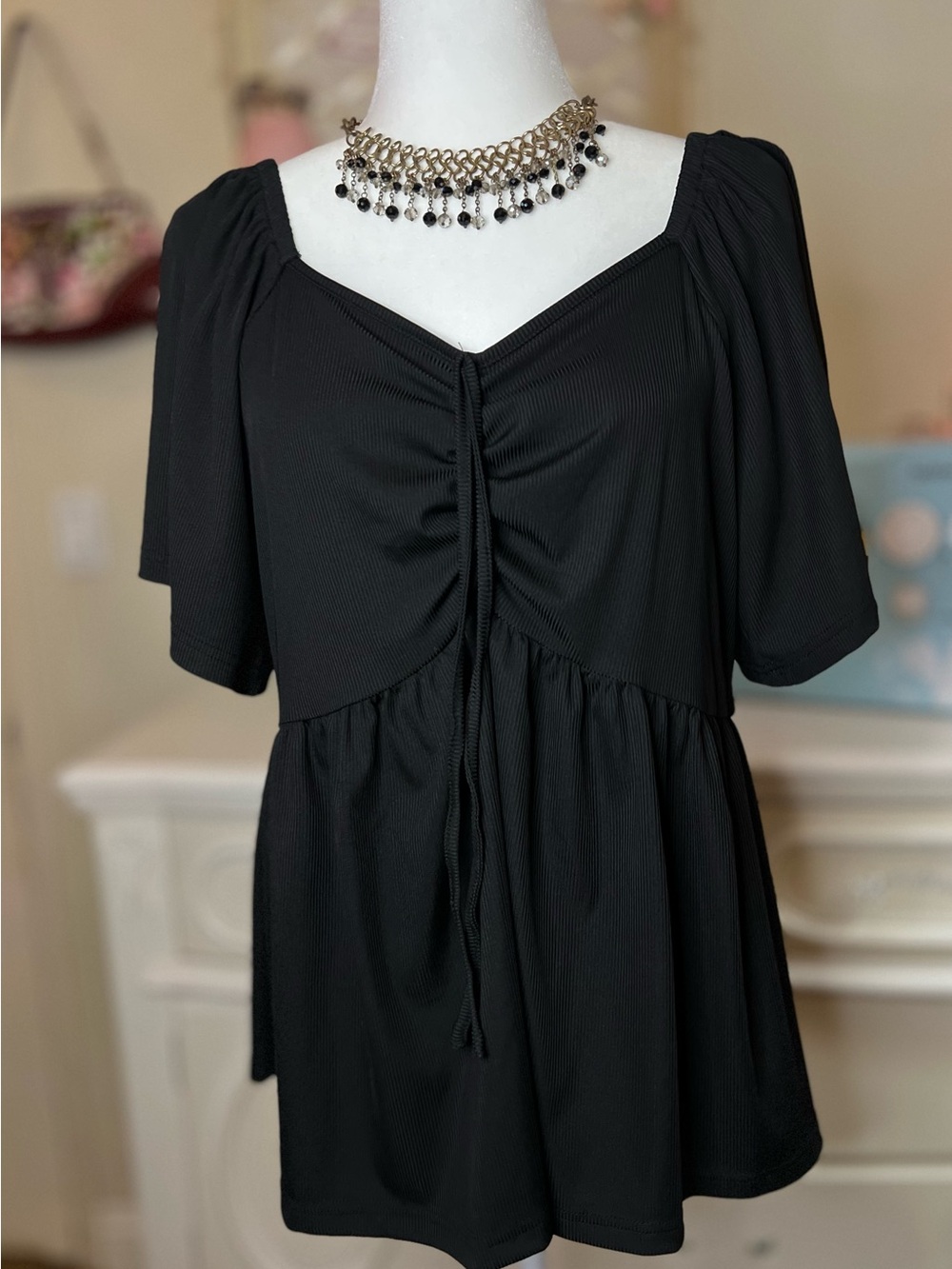 Women’s Black Ruched Peplum Top